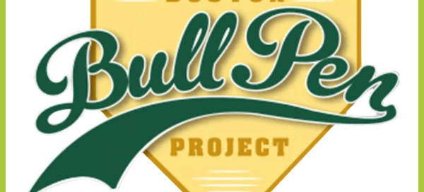 Logo of the Boston Bull Pen Project featuring scripted green and white text on a yellow shield background, bordered with a green outline, representing services to help the Boston community.