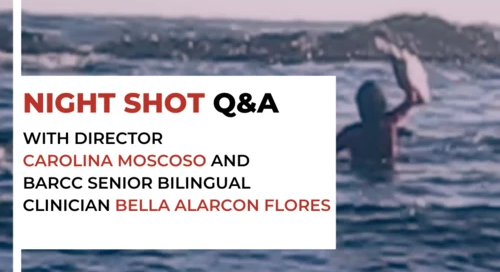 Person standing in the water holding a fish, with text promoting a Q&A event for "Night Shot" featuring Carolina Moscoso and Bella Alarcon Flores on Tuesday, Dec. 15, 4 PM Eastern. Discover how this film creates awareness of rape crisis center services and offers hope to those seeking help.