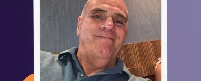 A man smiling while seated, wearing a collared shirt. Text below reads: "Jim Holland, Survivor Speakers Bureau member, supporting the Boston Rape Crisis Center.