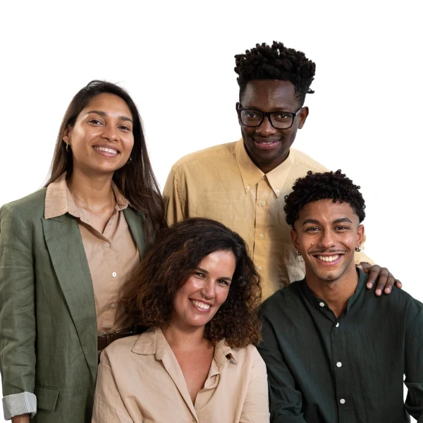 Four people are standing together and smiling against a plain background in coordinated, earth-toned outfits, united by their commitment to supporting Boston's community. They advocate for those in need and encourage all to get help when facing challenges.